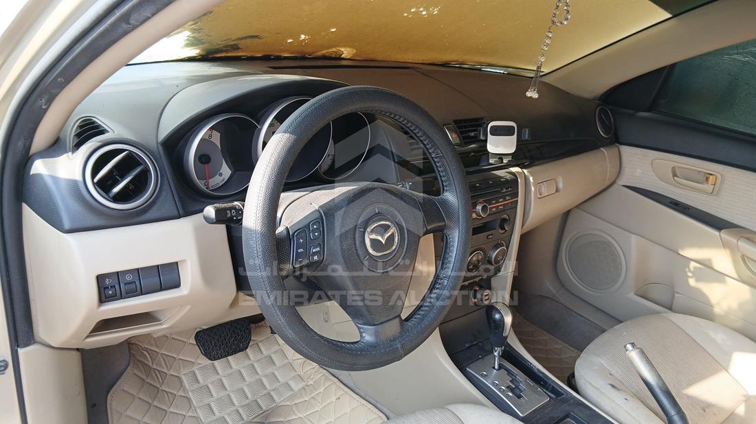 مازدا 3 2009 — زاوية واجهة السائق الأمامية اليسرى — صورة 11