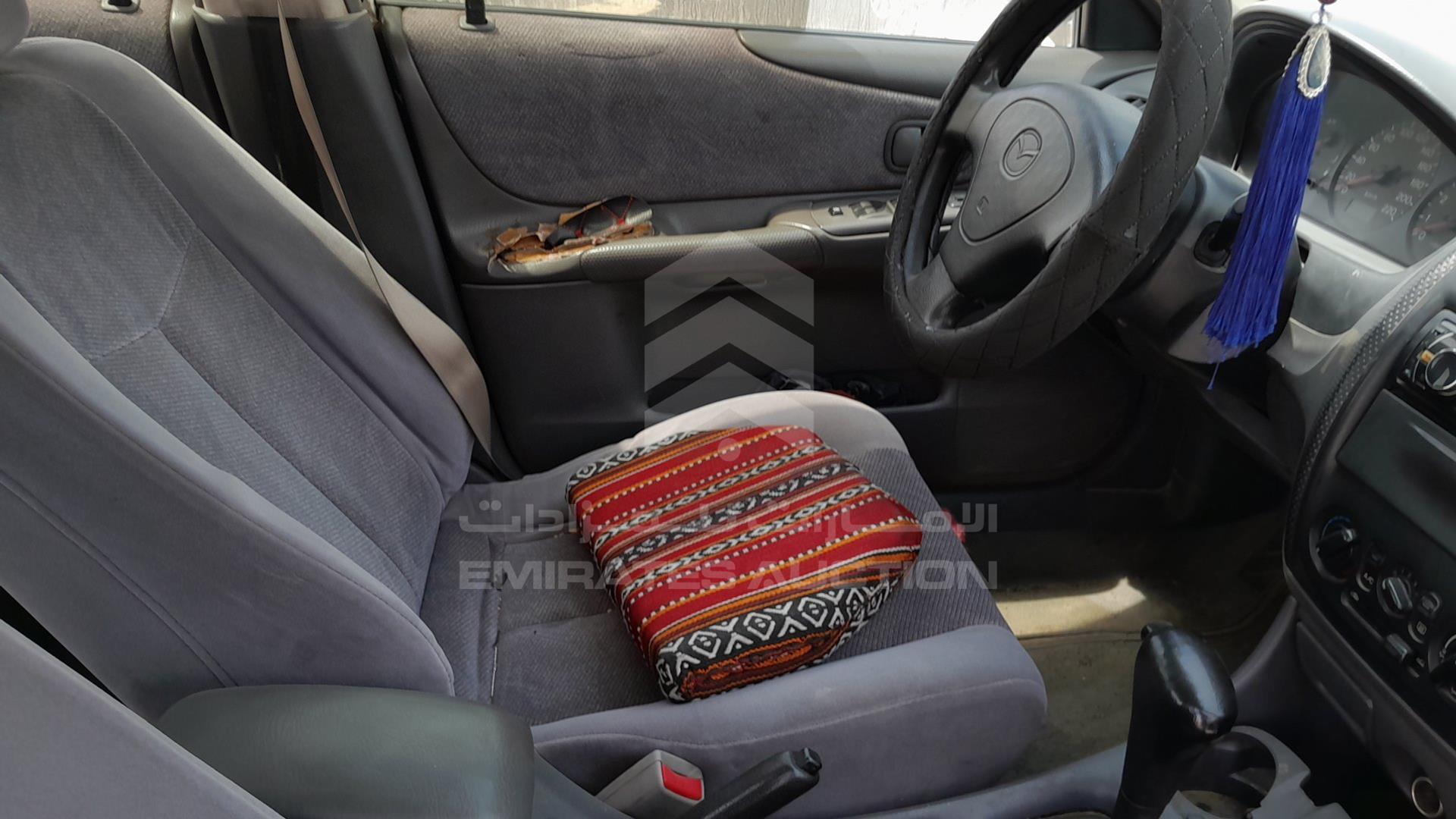 1999 MAZDA 323 VIN: JM7BJ12M9X0106555