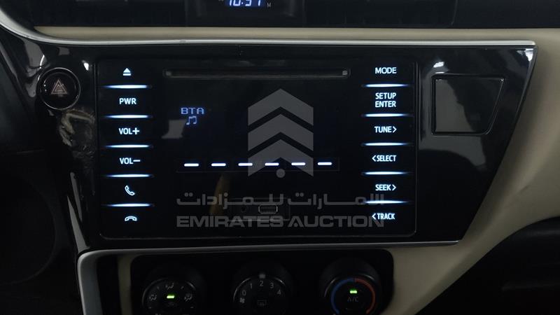 RKLBB9HE9J5206559 Auction: EmiratesAuction Lot: 404120 RKLBB9HE9J5206559 Toyota Corolla 2018 WHITE Photo 16