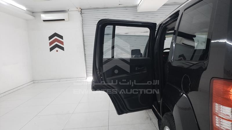1J4PN2GKXAW148555 Auction: EmiratesAuction Lot: 406545 1J4PN2GKXAW148555 Jeep Cherokee 2010 BLACK Photo 20