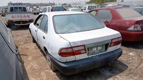 1999 Nissan Sunny — Rear Left Angle — Photo 6 — Thumbnail