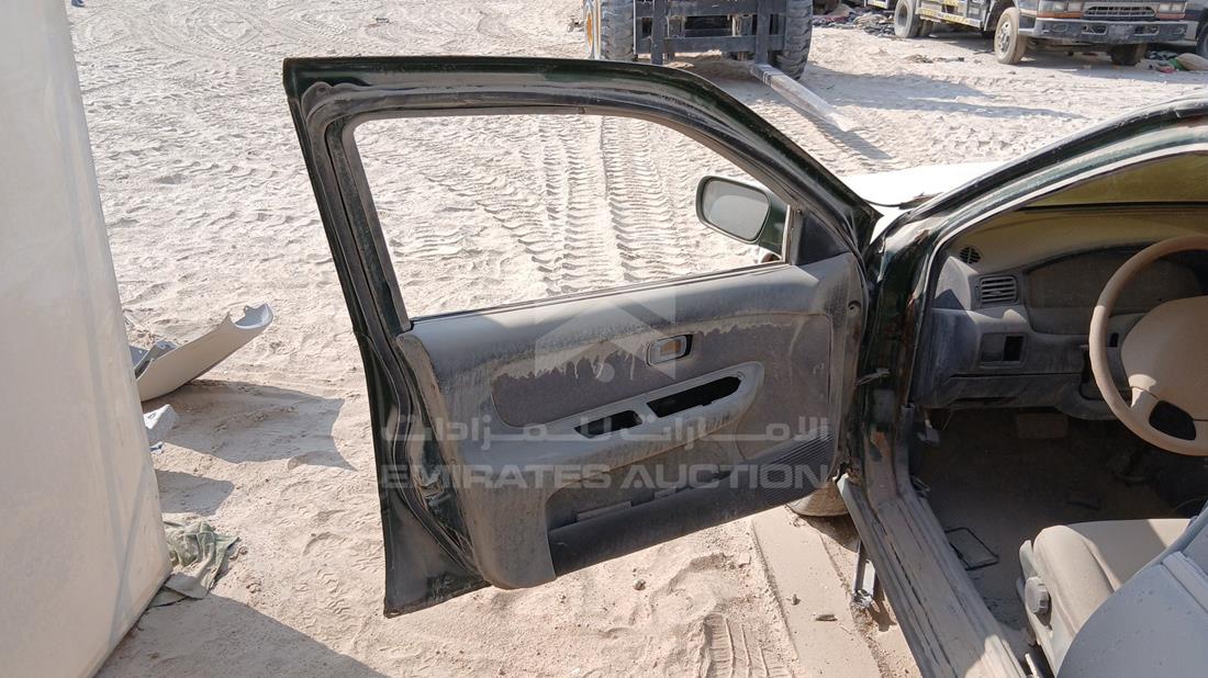 1999 Nissan Sunny — Front Left Door — Photo 9