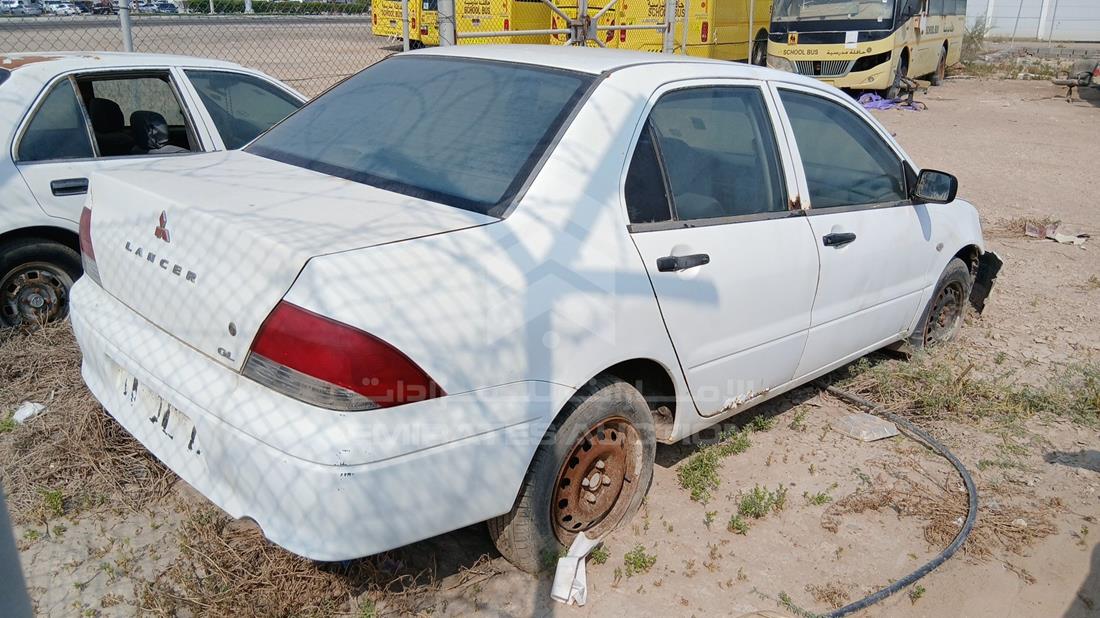 2002 Mitsubishi Lancer — Rear Right Angle — Photo 8