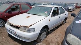 1999 Nissan Sunny — Front Left Angle — Photo 5 — Thumbnail