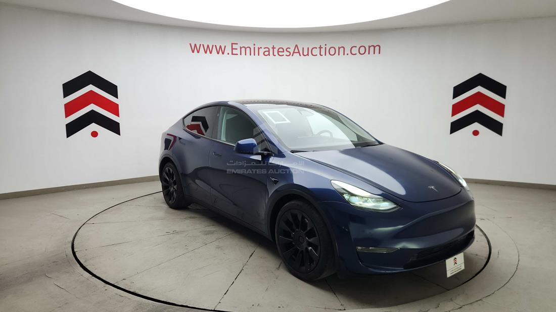 تيسلا Model Y 2024 — الزاوية الأمامية اليمنى — صورة 11