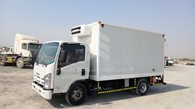 2025 Isuzu NPR — Front Left Angle — Photo 6 — Thumbnail