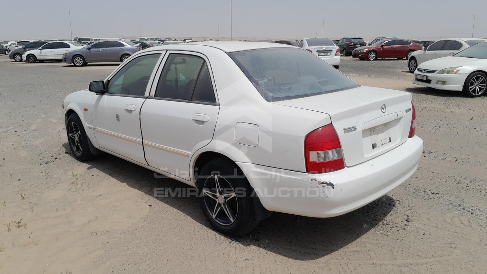 1999 MAZDA 323 VIN: JM7BJ12M9X0106555