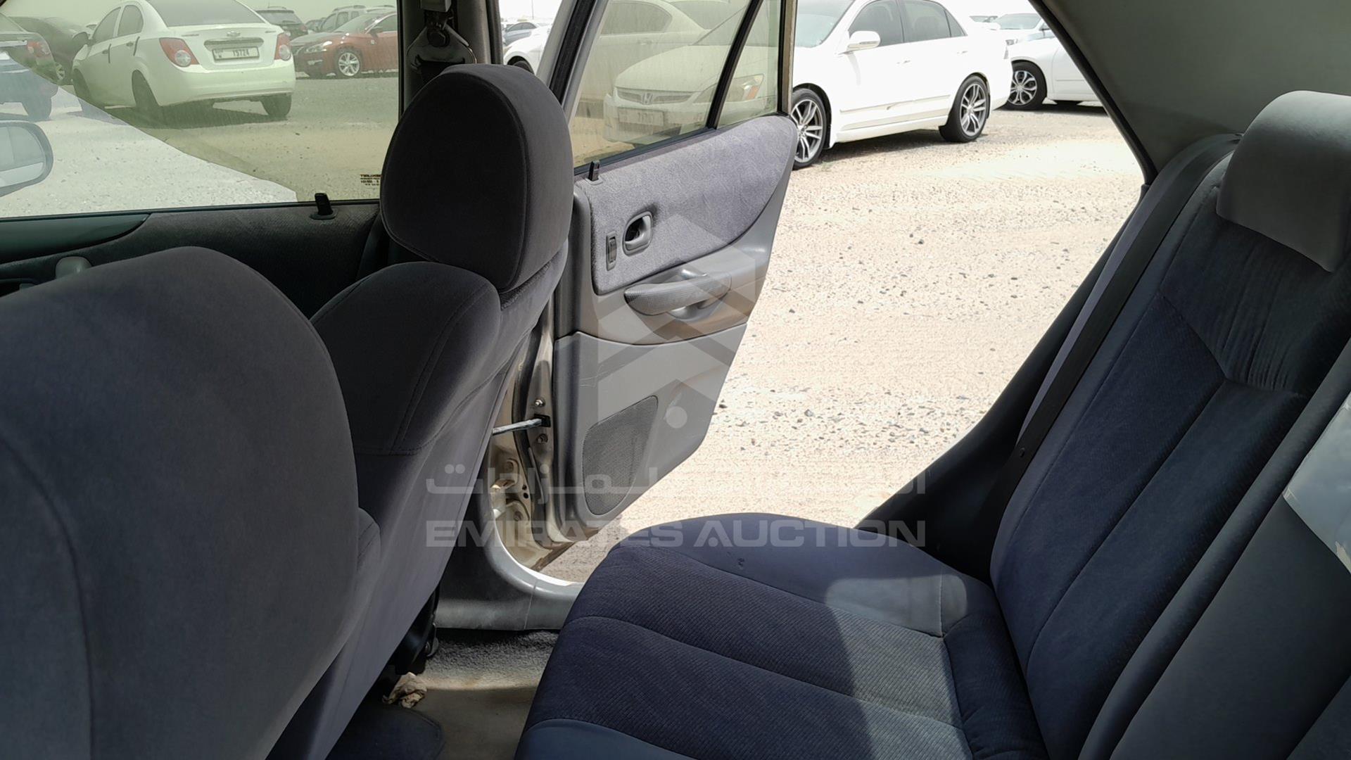 1999 MAZDA 323 VIN: JM7BJ12M9X0106555