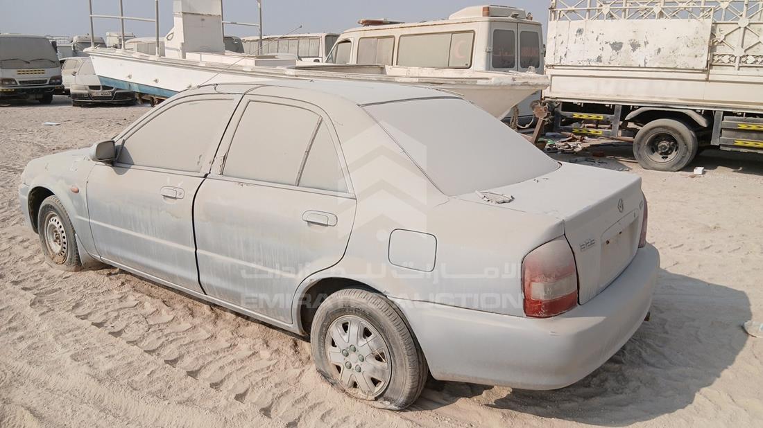 2000 Mazda 323 — Rear Left Angle — Photo 6
