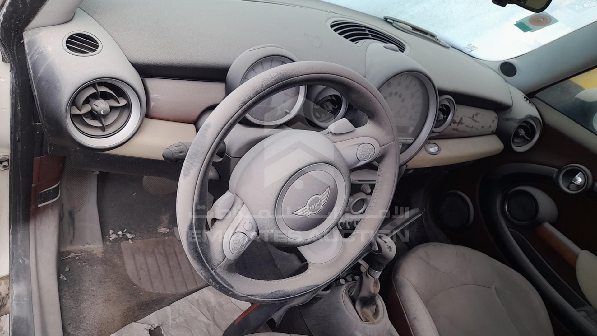 2009 MINI COOPER VIN: WMWML33559TN68870