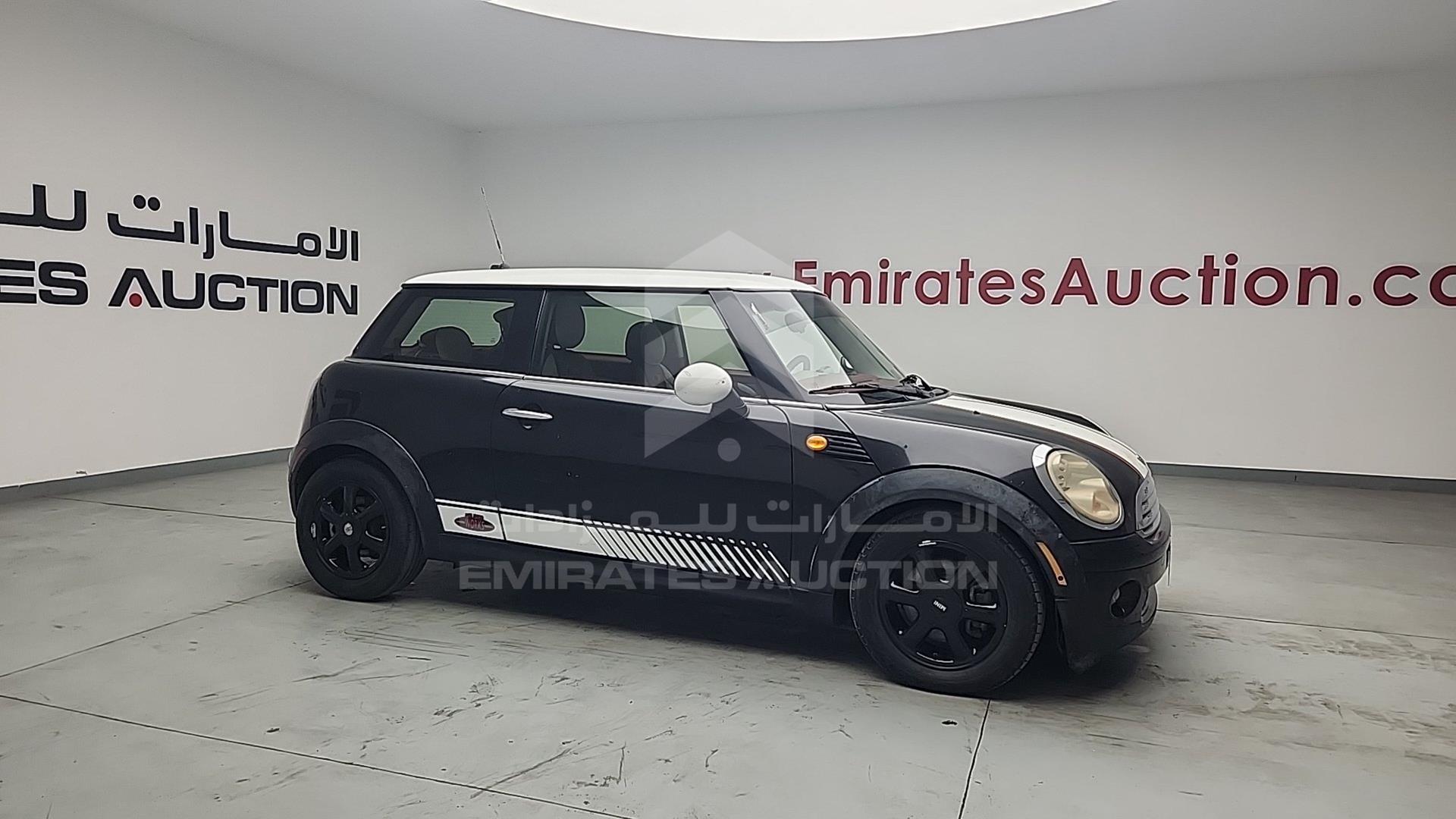 2010 MINI COOPER VIN: WMWMF3C55ATZ25394