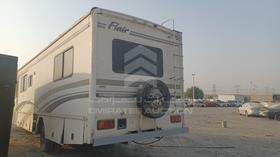 Caravan — Rear Left Angle — Photo 4 — Thumbnail