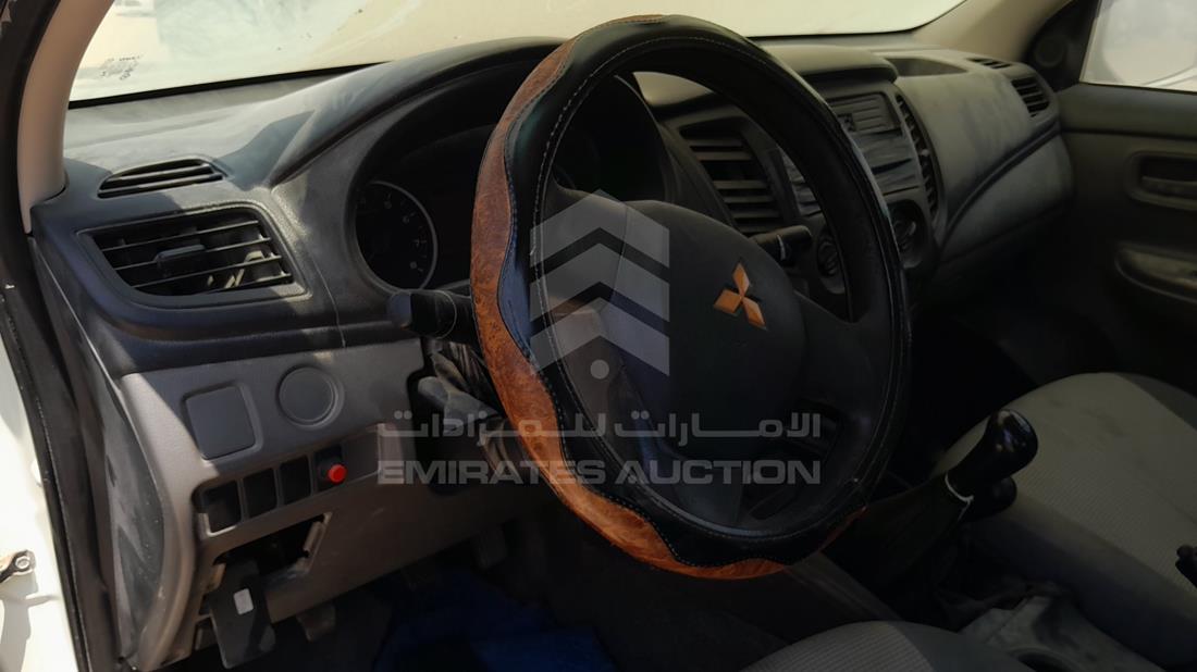 ميتسوبيشي L 200 2016 — زاوية واجهة السائق الأمامية اليسرى — صورة 12
