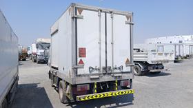 2013 Isuzu Reward NM — Rear Left Angle — Photo 6 — Thumbnail