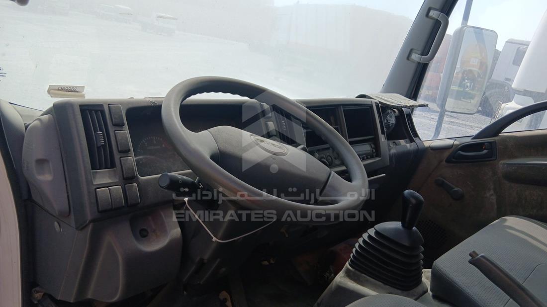 2014 Isuzu NMR — Front Left Driver Dashboard View — Photo 11