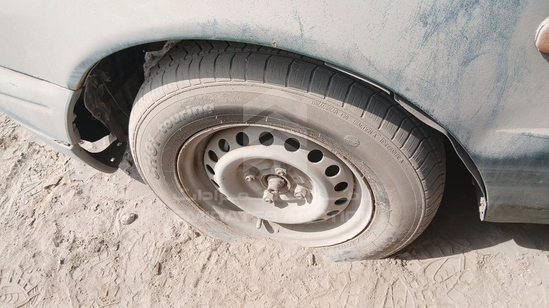 تويوتا كورولا 1998 — الإطار الأمامي الأيسر — صورة 33