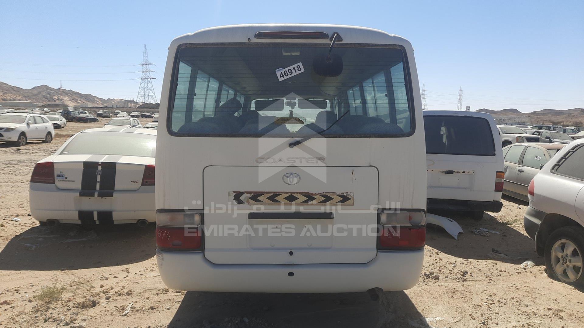 2012 TOYOTA COASTER VIN: JTGFK518XC4009729