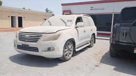 2010 Lexus LX 570 — Front Left Angle — Photo 5 — Thumbnail