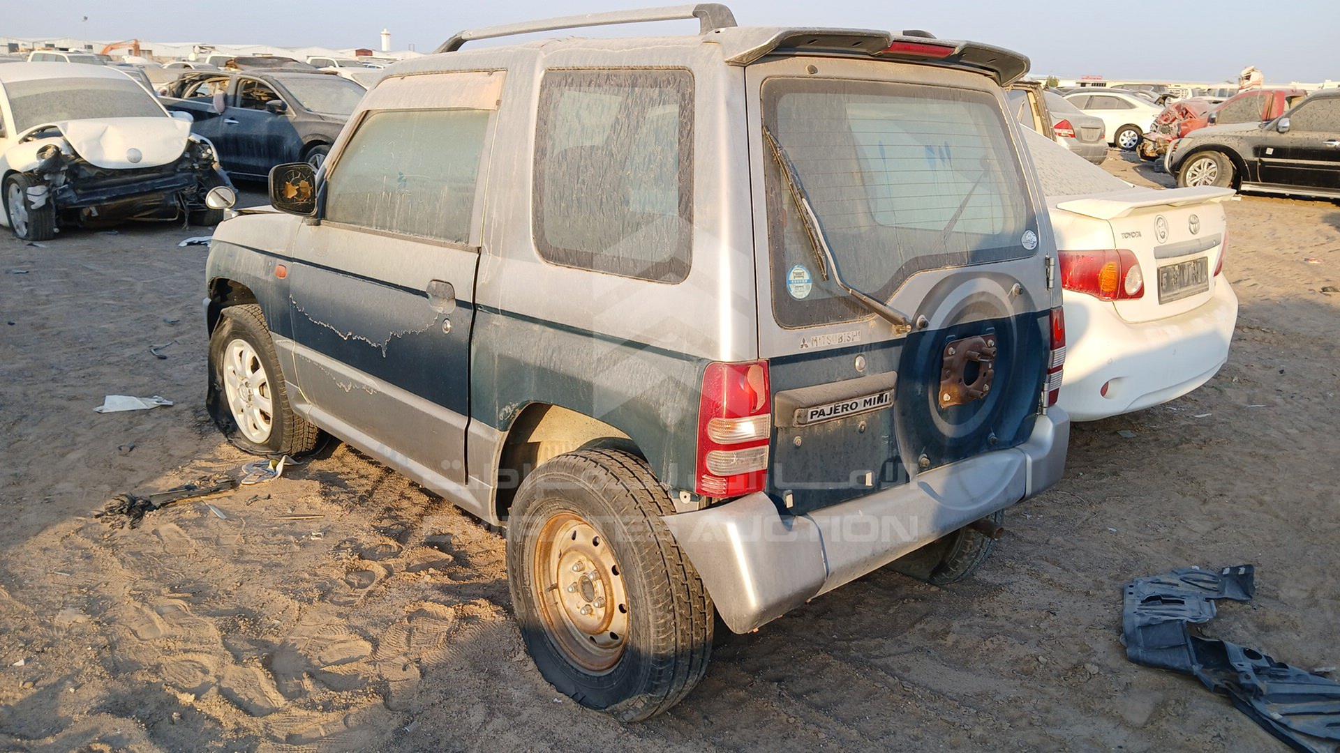 1995 MITSUBISHI PAJERO MINI VIN: H56A5219694