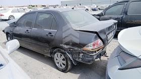 2010 Mitsubishi Lancer — Rear Left Angle — Photo 6 — Thumbnail