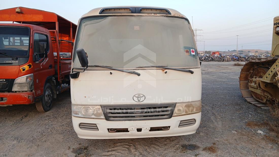 2014 Toyota Coaster — Full Front View — Photo 1