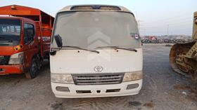 2014 Toyota Coaster — Full Front View — Photo 1 — Thumbnail