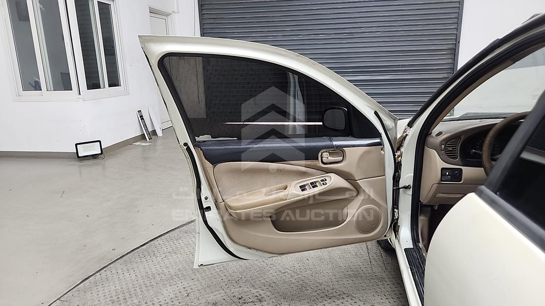 2004 Nissan Sunny — Front Left Door — Photo 11