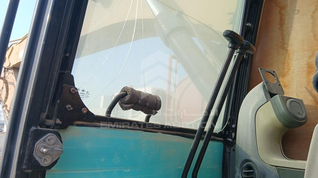 Caterpillar 330DL — Front Left Driver Dashboard View — Photo 11