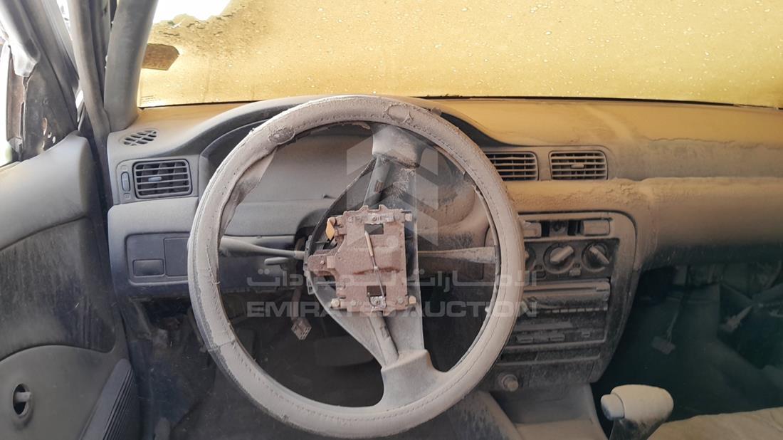 1999 Nissan Sunny — Steering & Mounted Controls — Photo 13