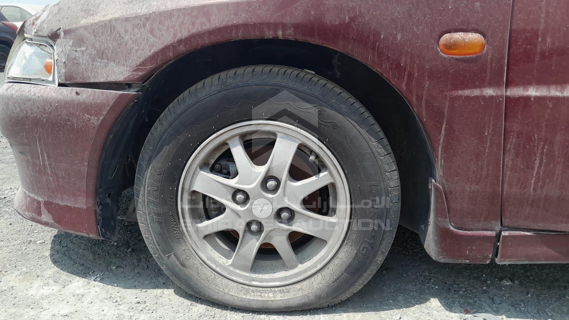 1999 MITSUBISHI LANCER VIN: JMYSRCK4AXU000886