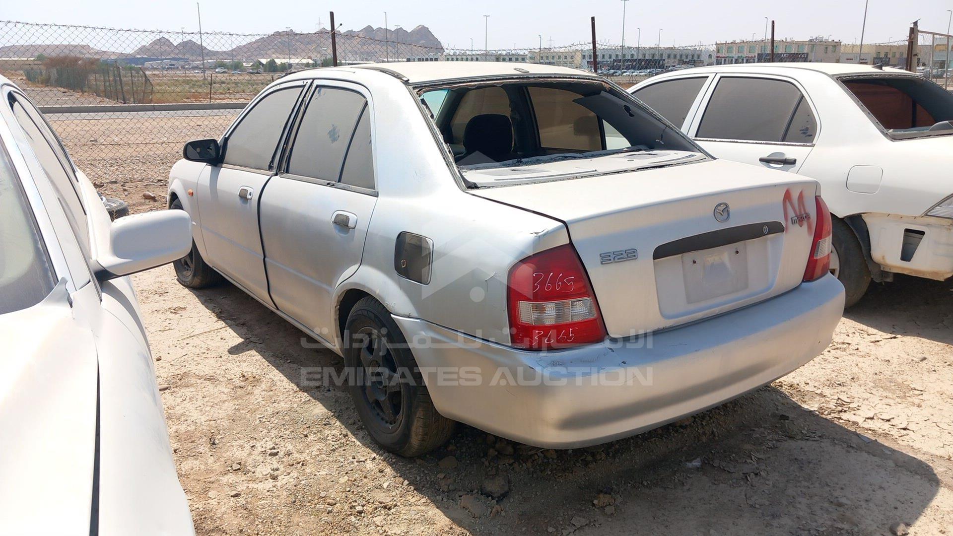 2003 MAZDA 323 VIN: JM7BJ12M231222037