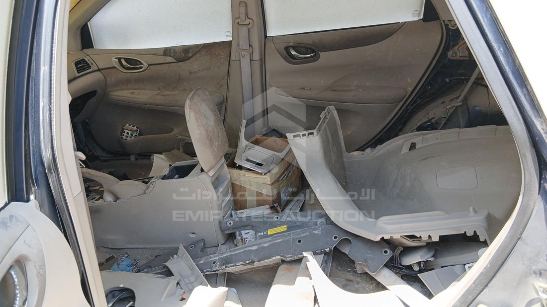 نيسان تيدا 2015 — زاوية الراكب الخلفي اليسرى — صورة 20