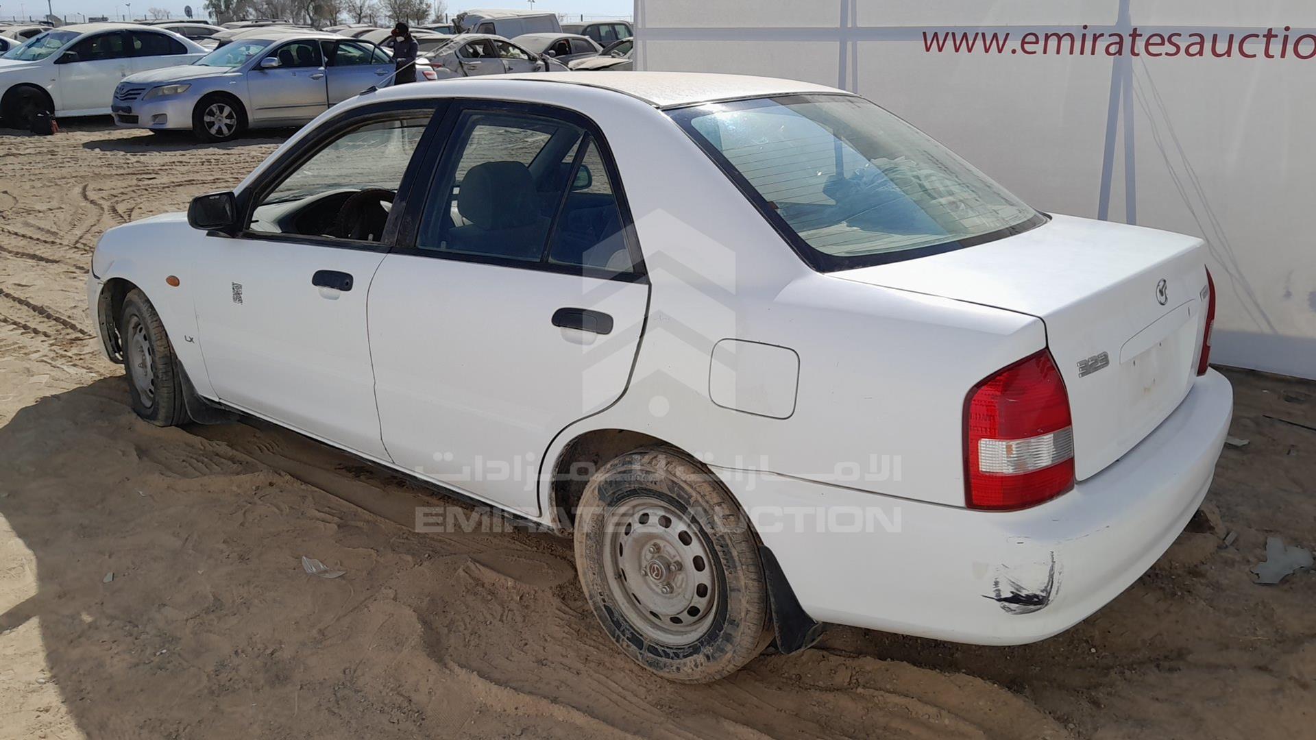 2002 MAZDA 323 VIN: JM7BJ123121209110