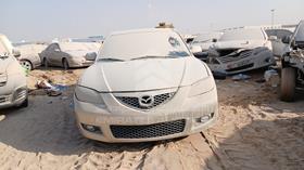 مازدا 3 2009 — الزاوية الأمامية بالكامل — صورة 1 — صورة مصغرة