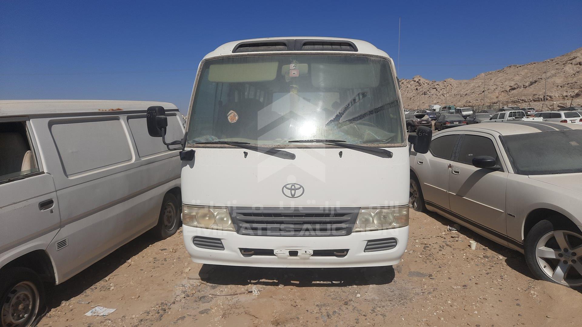 2012 TOYOTA COASTER VIN: JTGFK518XC4009729