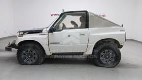 1990 Suzuki Vitara — Front Left Angle — Photo 5 — Thumbnail