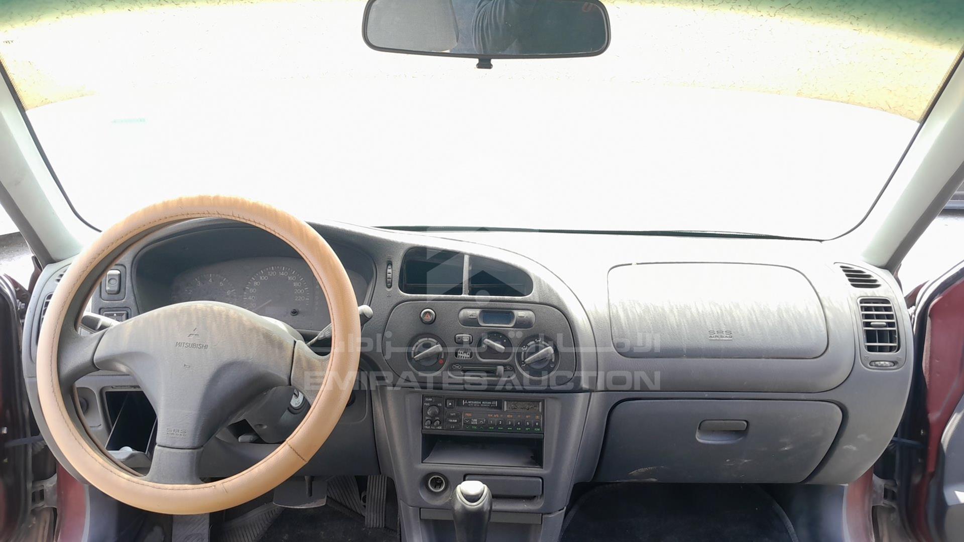 1999 MITSUBISHI LANCER VIN: JMYSRCK4AXU000886