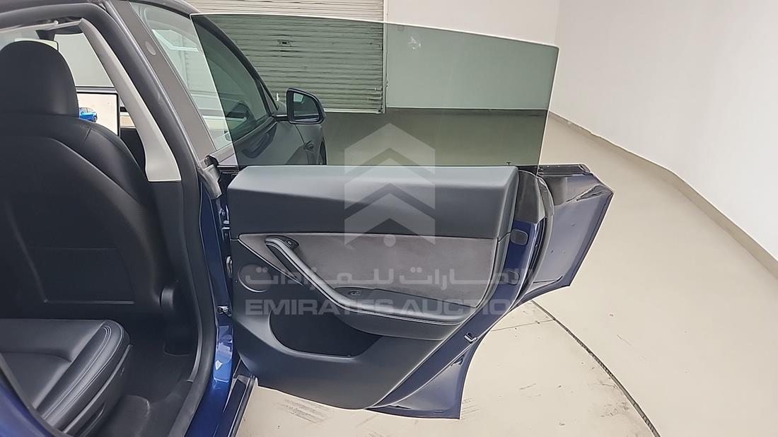 تيسلا Model Y 2024 — الباب الخلفي الأيمن — صورة 26