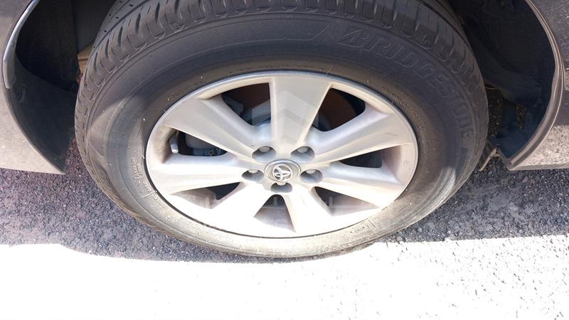 RKLBL9HE7F5236244 Auction: EmiratesAuction Lot: 408508 RKLBL9HE7F5236244 Toyota Corolla 2015 GREY Photo 32