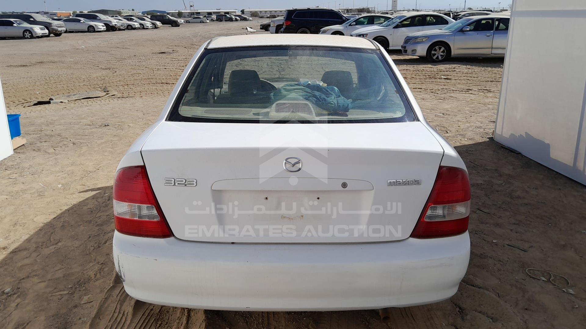 2002 MAZDA 323 VIN: JM7BJ123121209110
