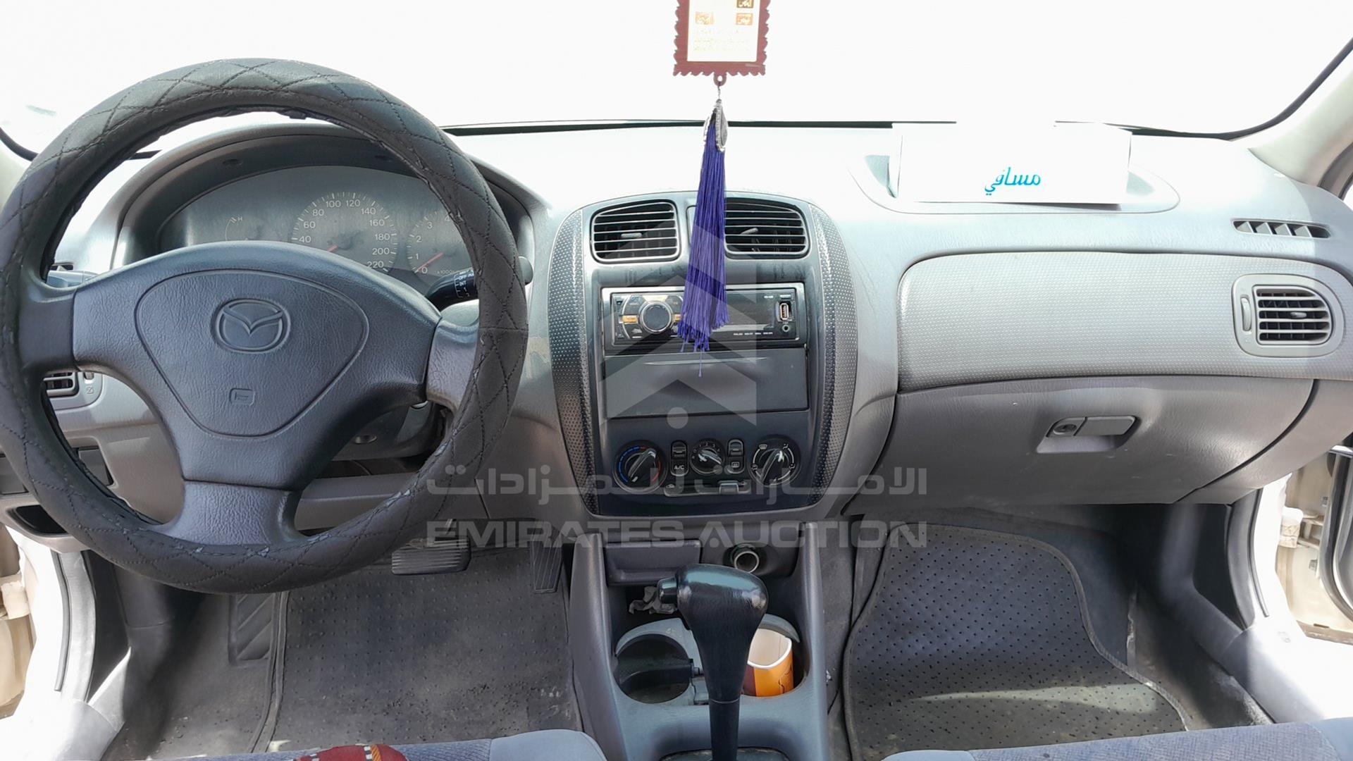 1999 MAZDA 323 VIN: JM7BJ12M9X0106555
