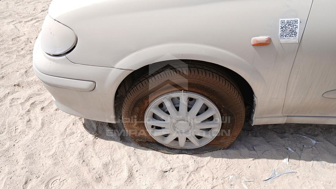 نيسان صني 2001 — الإطار الأمامي الأيسر — صورة 33