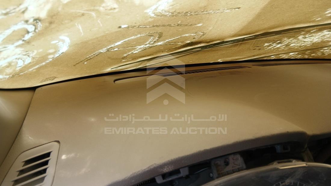 نيسان تيدا 2015 — زاوية واجهة السائق الأمامية اليسرى — صورة 11