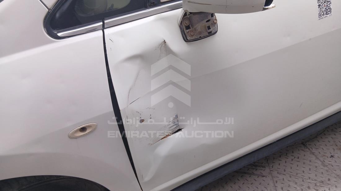 نيسان تيدا 2008 — انبعاج — صورة 31