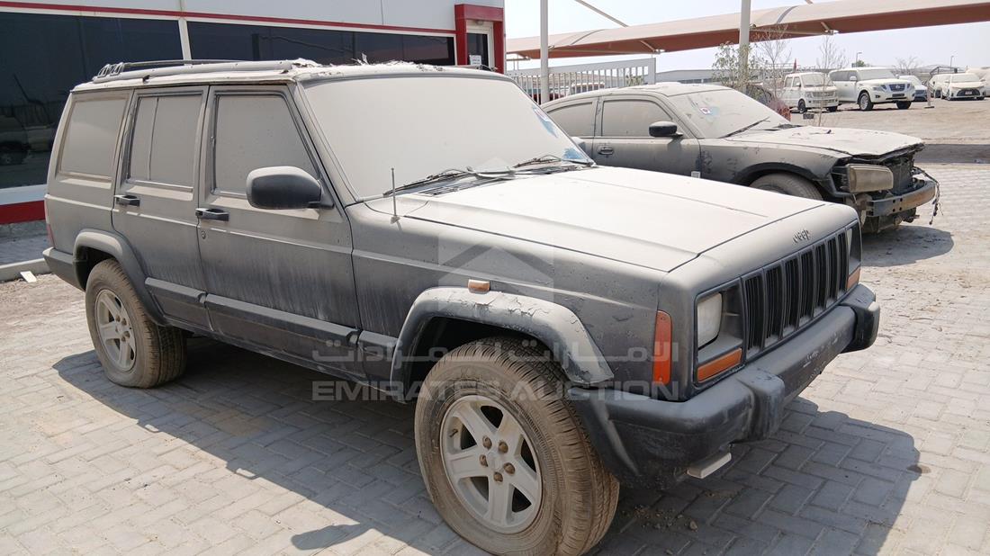 جيب شيروكي 1998 — الزاوية الأمامية اليمنى — صورة 9
