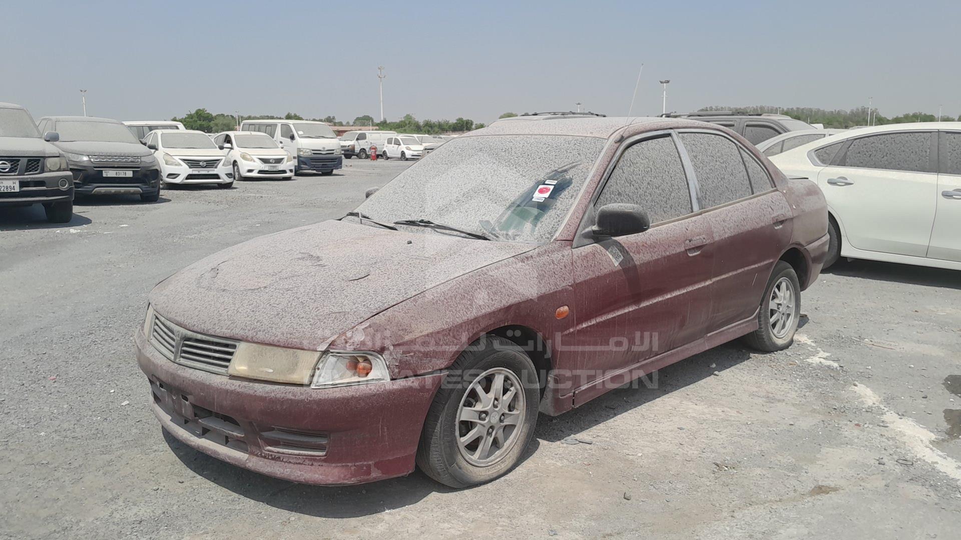 1999 MITSUBISHI LANCER VIN: JMYSRCK4AXU000886