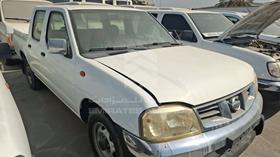2009 Nissan Pick up D/C — Front Left Angle — Photo 5 — Thumbnail