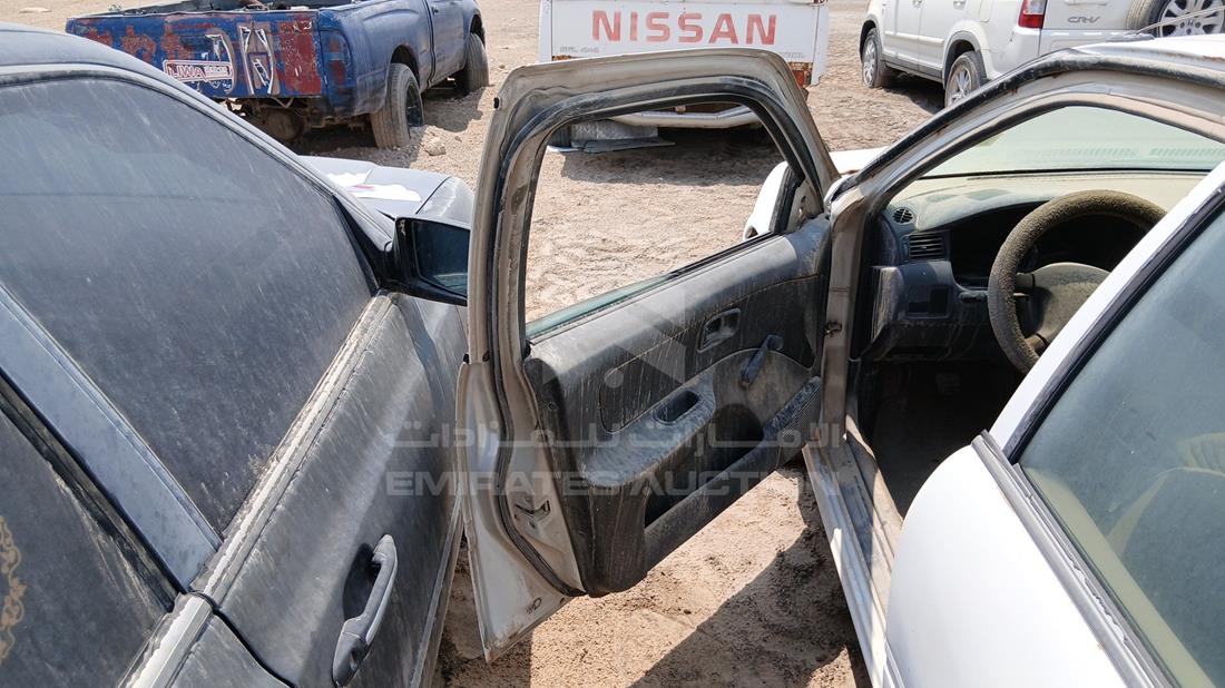 1999 Nissan Sunny — Front Left Door — Photo 9
