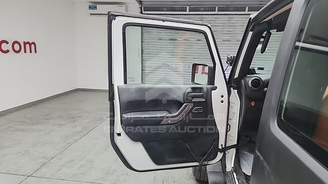 2014 Jeep Wrangler — Front Left Door — Photo 10
