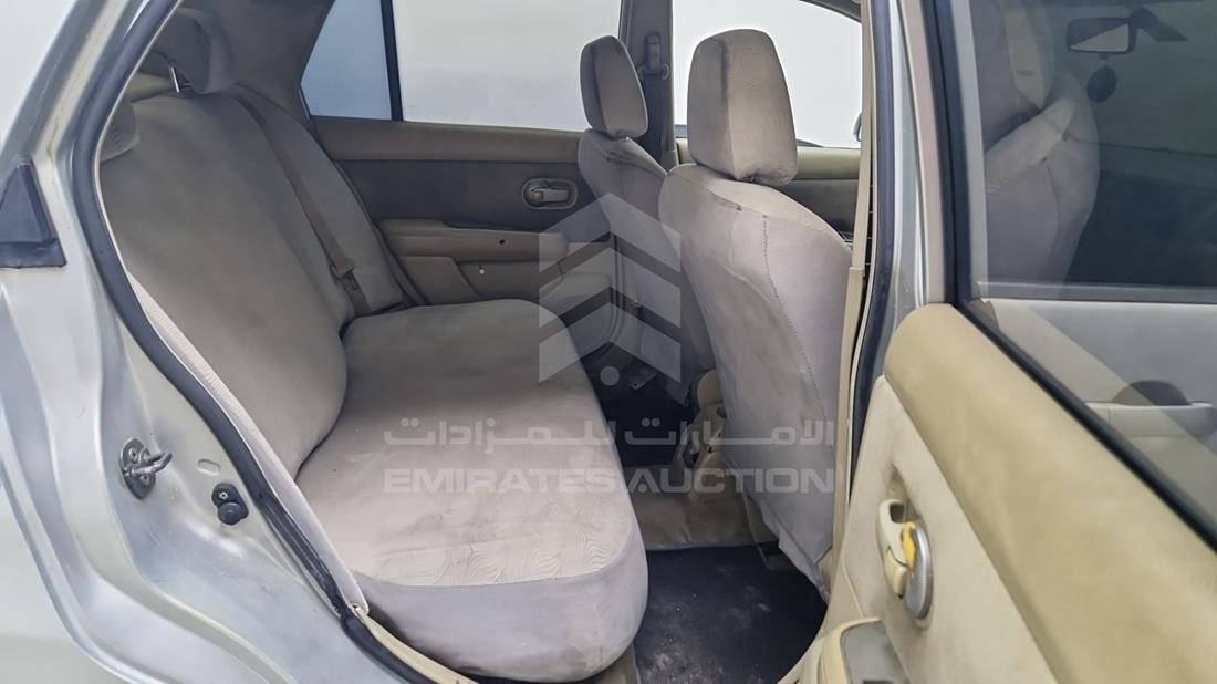 نيسان تيدا 2008 — زاوية الراكب الخلفي اليمنى — صورة 24